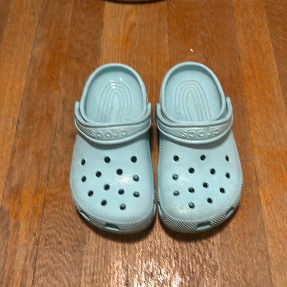 Light blue crocs, size 1 clean